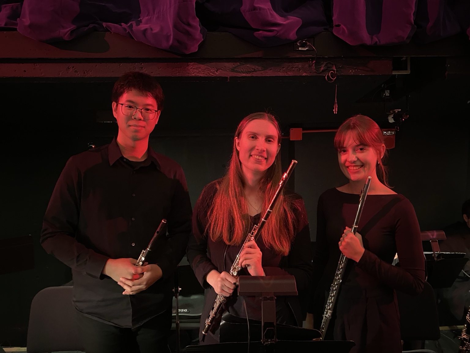 Jimmy Chiu with flute section colleagues in the Indiana University opera orchestra pit