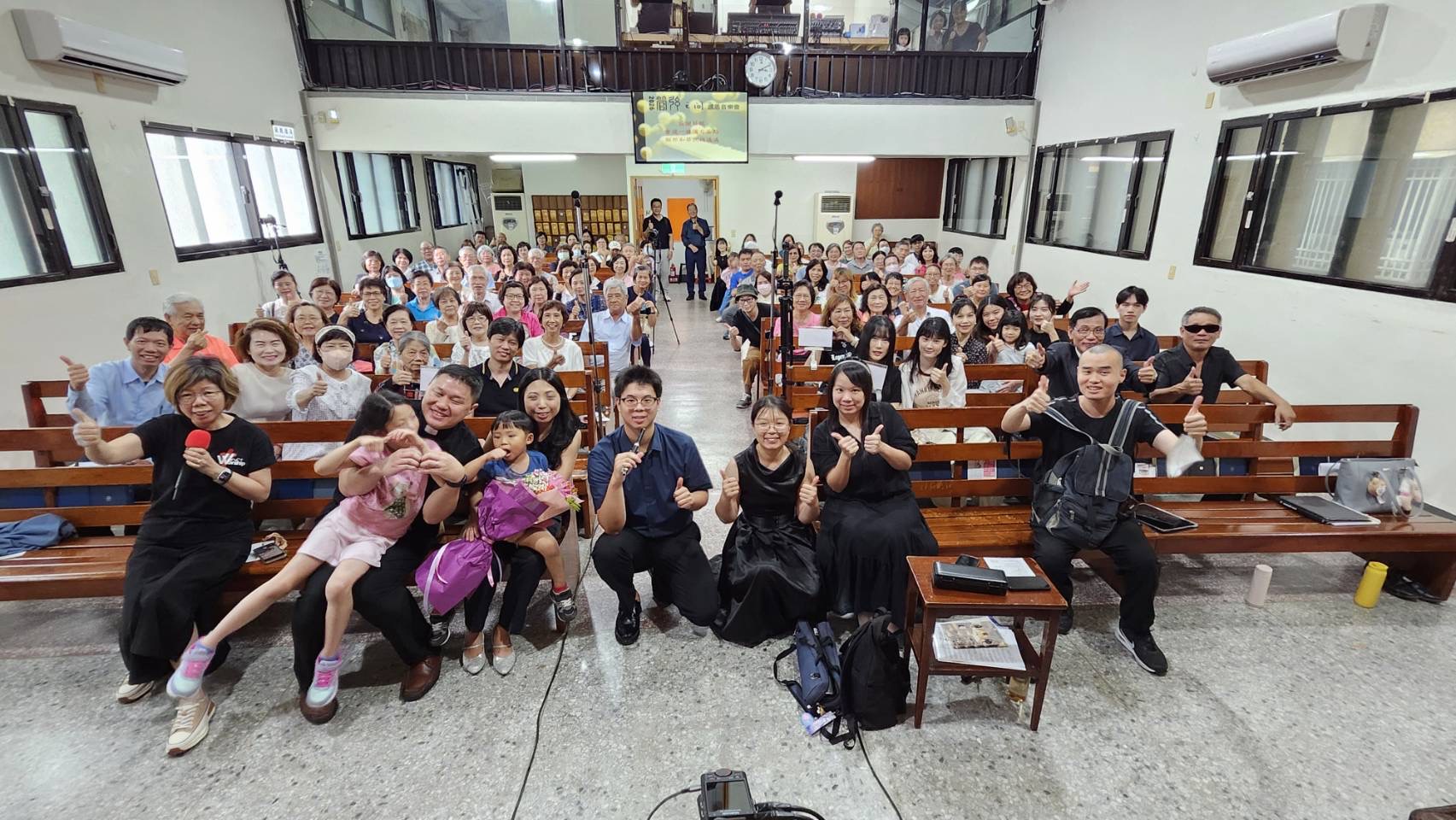 Jimmy Chiu with musicians and audience members after a recital in Taiwan